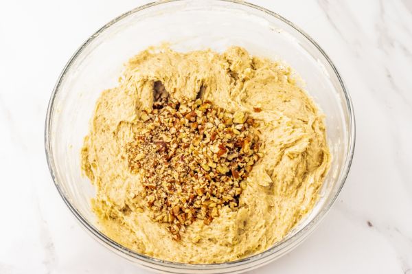 adding nuts to banana bread cookie batter