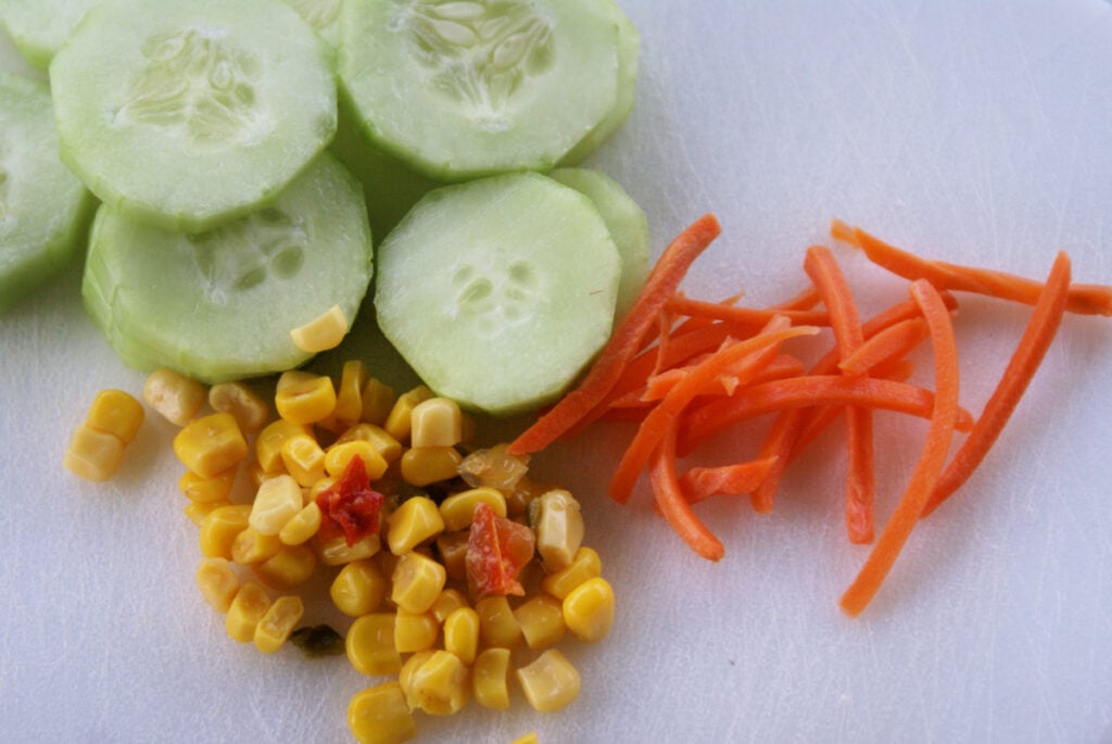 ingredients to make a fresh fiesta corn with cucumbers salad
