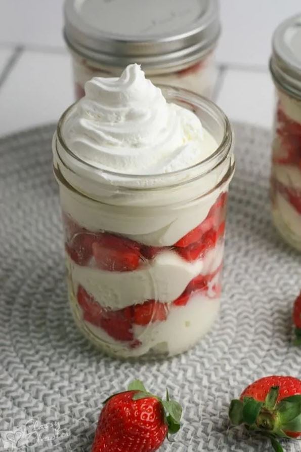 strawberry cheesecake in a mason jar