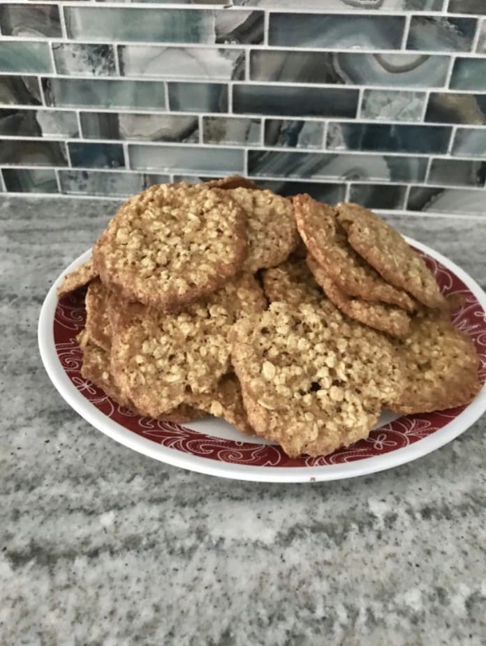 pile of oatmeal raisin cookies on a plate