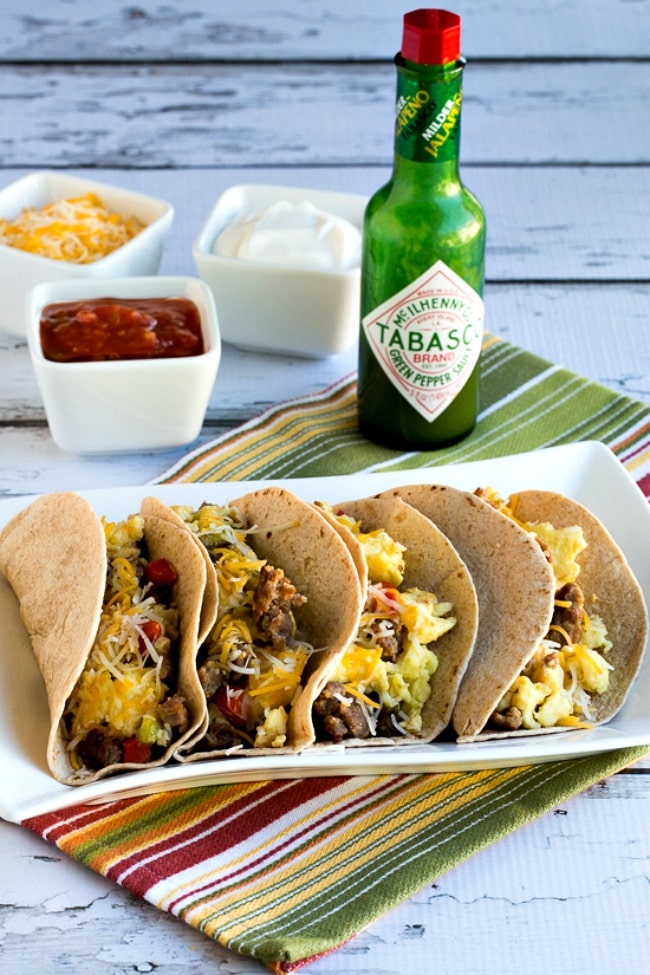 breakfast tacos with sauces and tobasco hot sauce