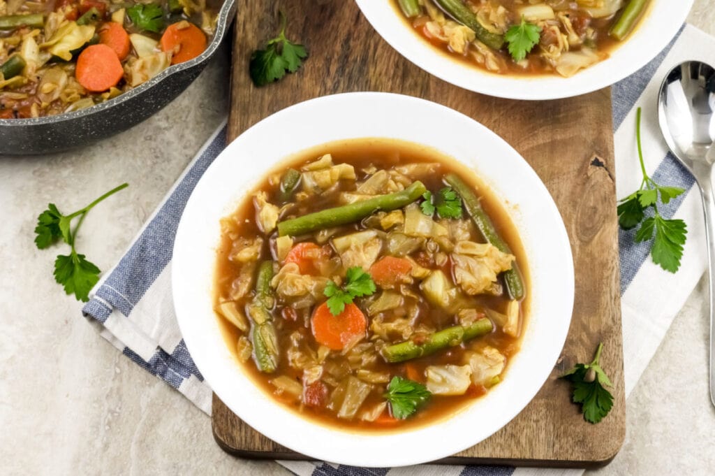 white bowl of healthy cabbage soup