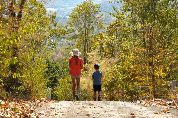 two children walking in nature