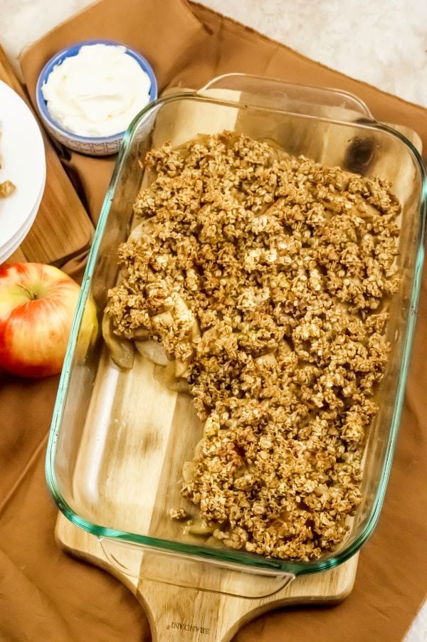 pan of Weight Watchers apple crisp with one piece missing
