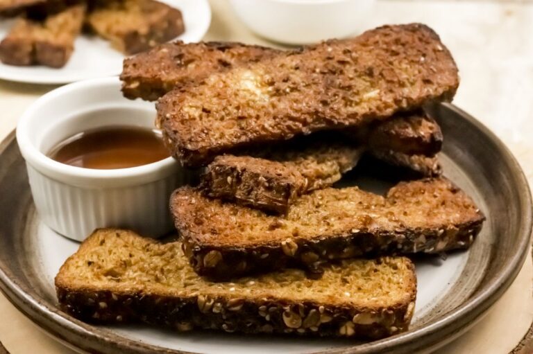 plate of wheat french toast sticks that were cooked in air fryer