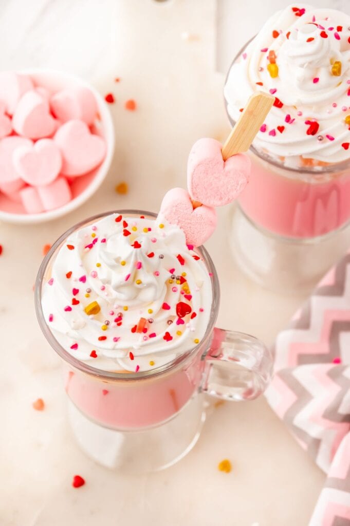 overview image of a glass mug of cupid cocoa with heart shaped marshmallows