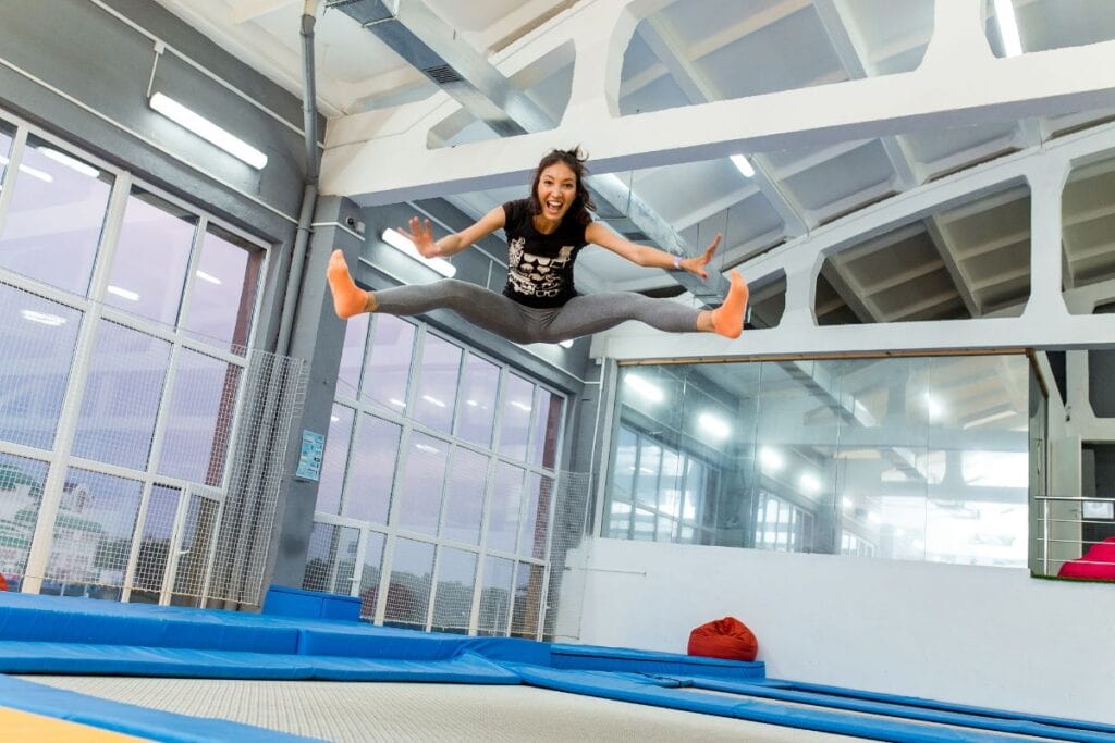girl jumping at a trampoline park
