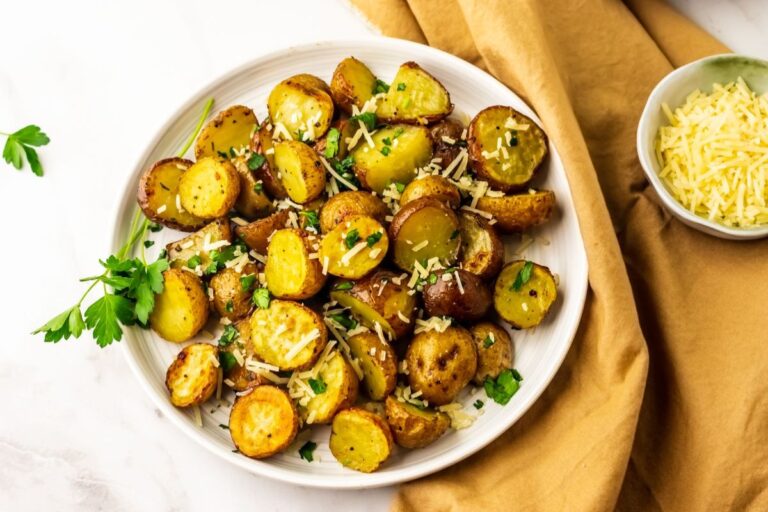 Italian Roasted Potatoes with a bowl of cheese on the side