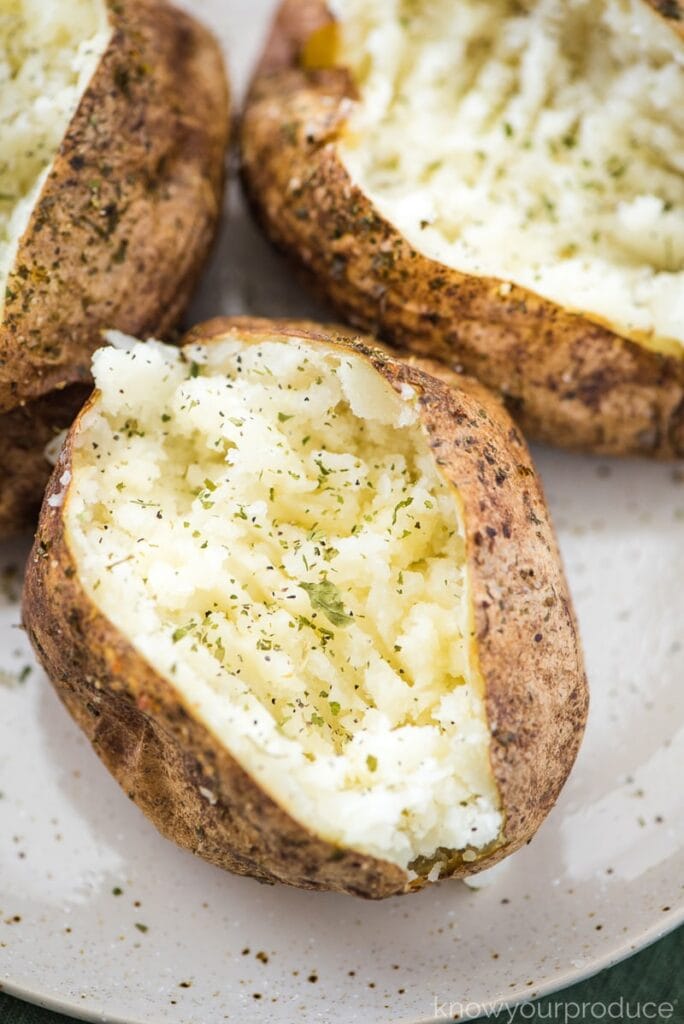 simple baked potato with garnish