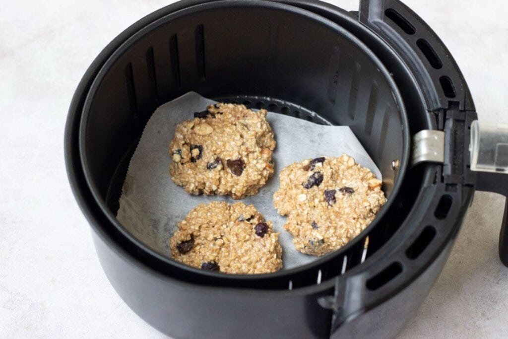 oatmeal cookies in an air fryer basket