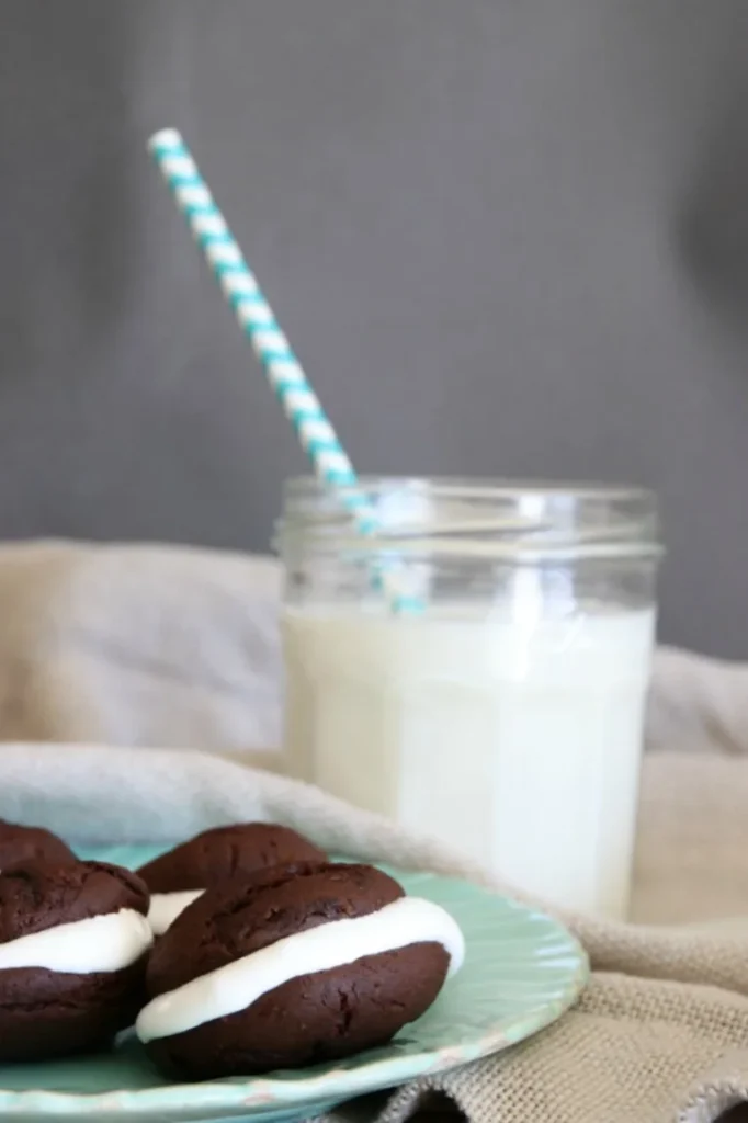 Plate Chocolate Whoopie Pies with a Glass of Milk