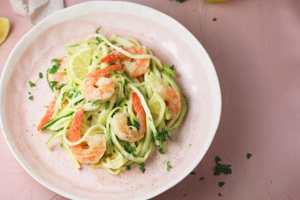 shrimp zoodles garnished with cilantro