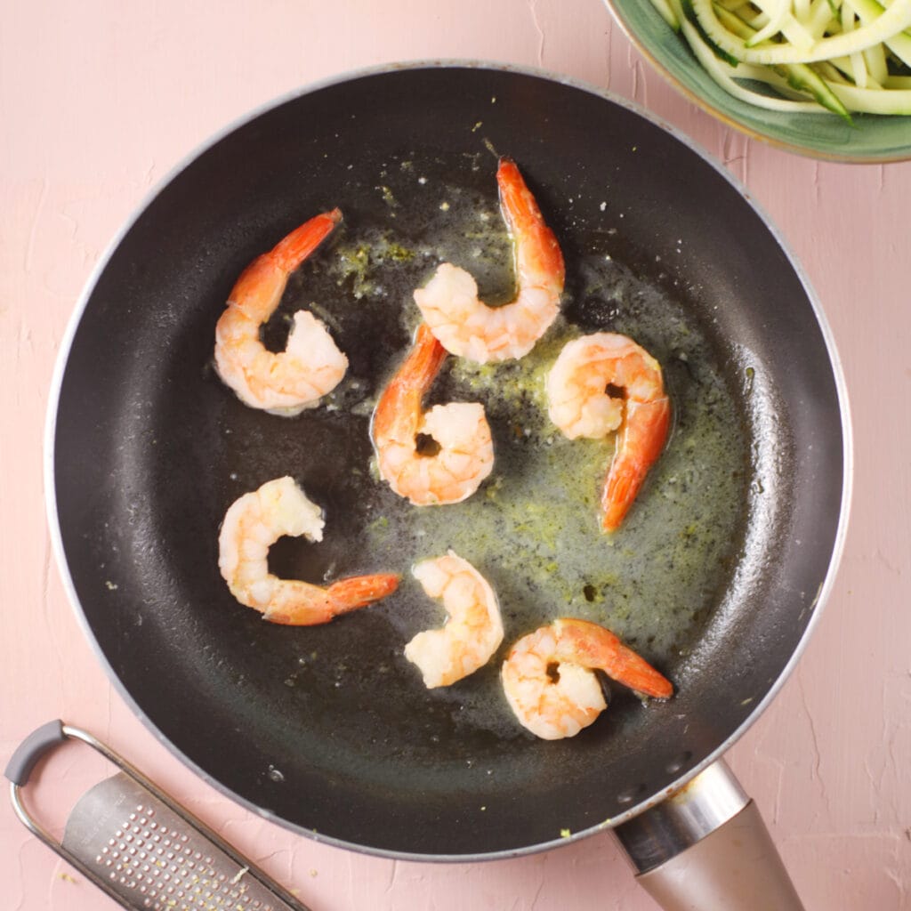 searing shrimps on a pan