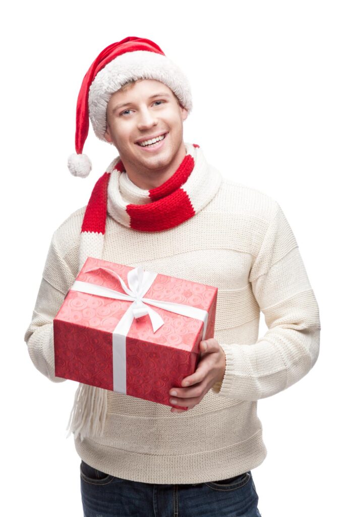 guy holding a christmas gift