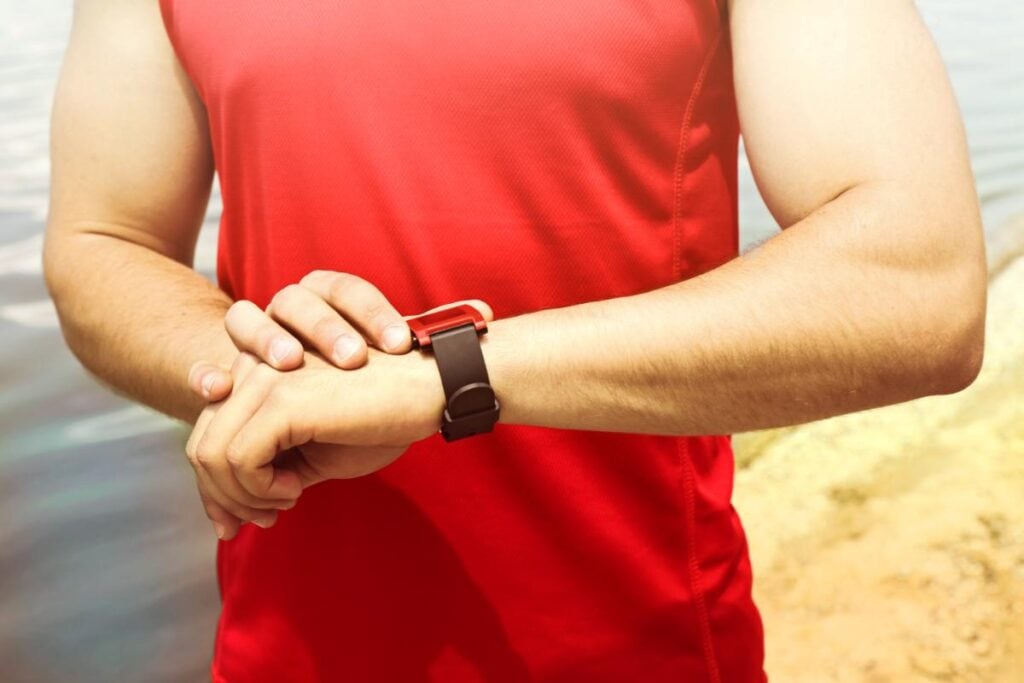 guy checking his smart watch