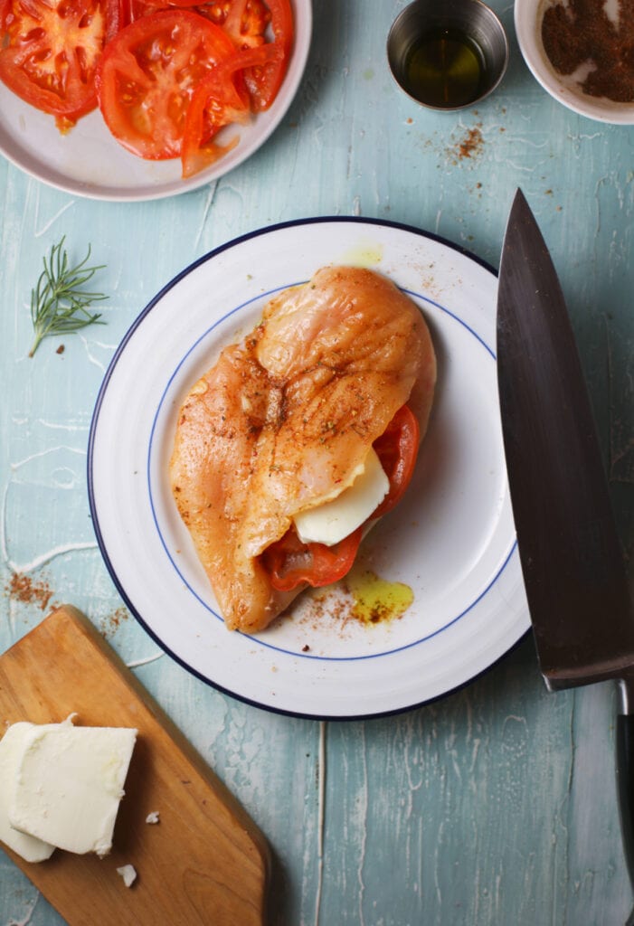 season stuffed chicken on a plate