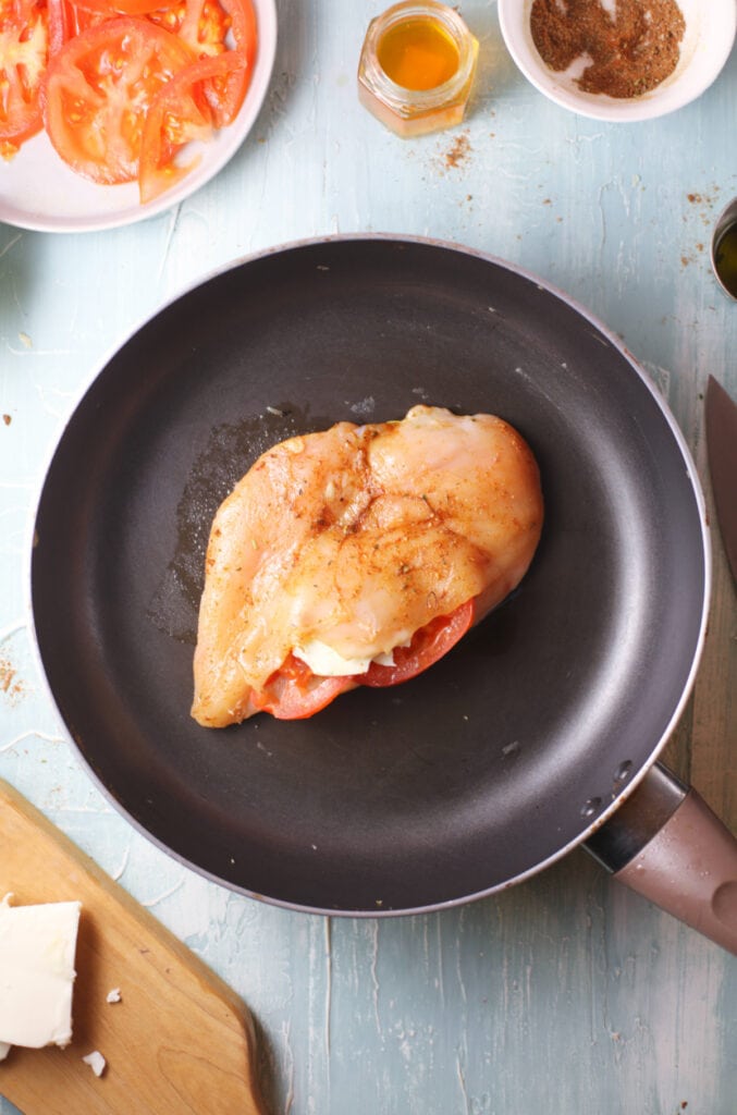 stuffed chicken on a skillet
