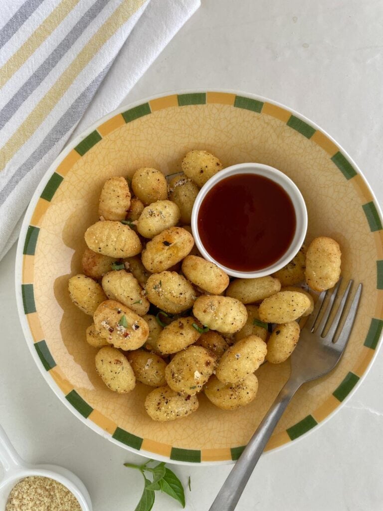 Top view of an air fried seasoned gnocchi