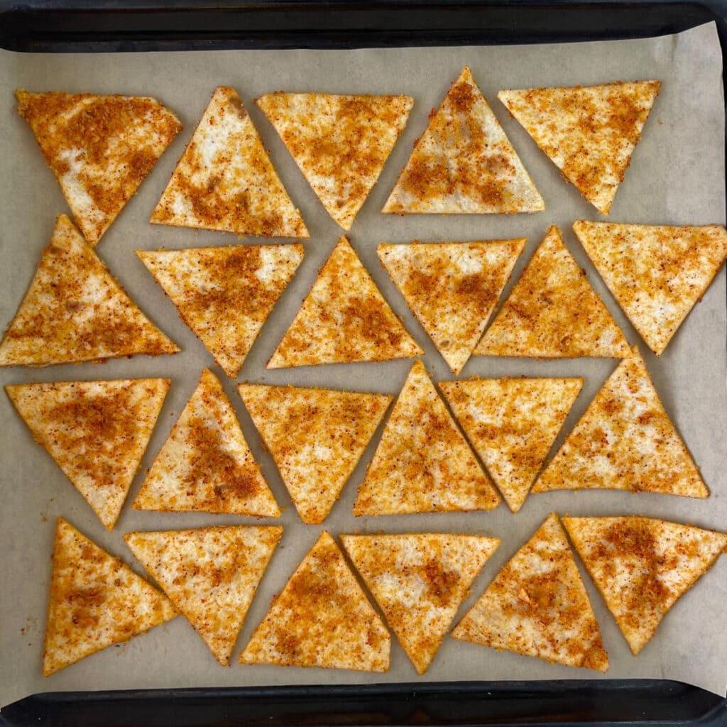 tortilla chips on a baking pan