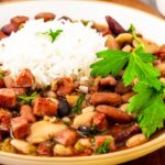 Rice, Ham, and Bean Plate topped with greens