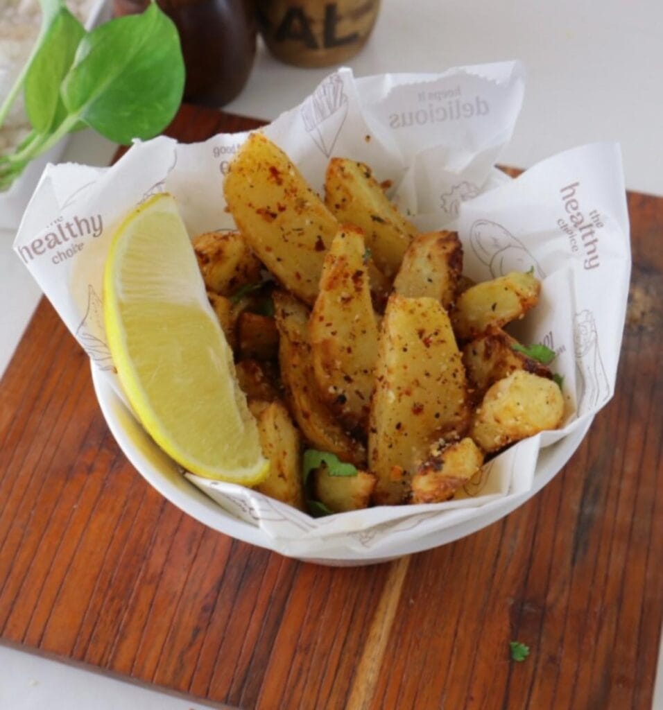 wedges in a cup with a slice of lemon