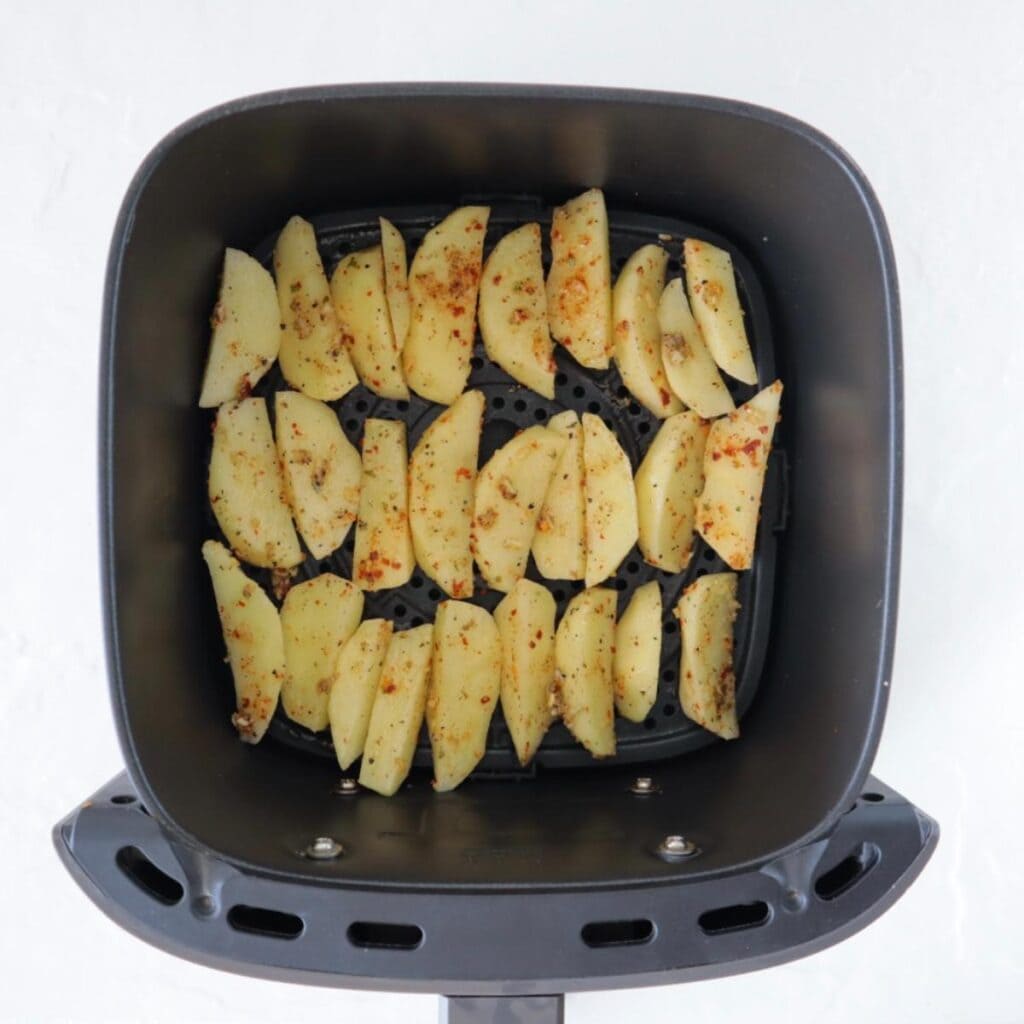 Potato Wedges in a Single Layer inside the basket
