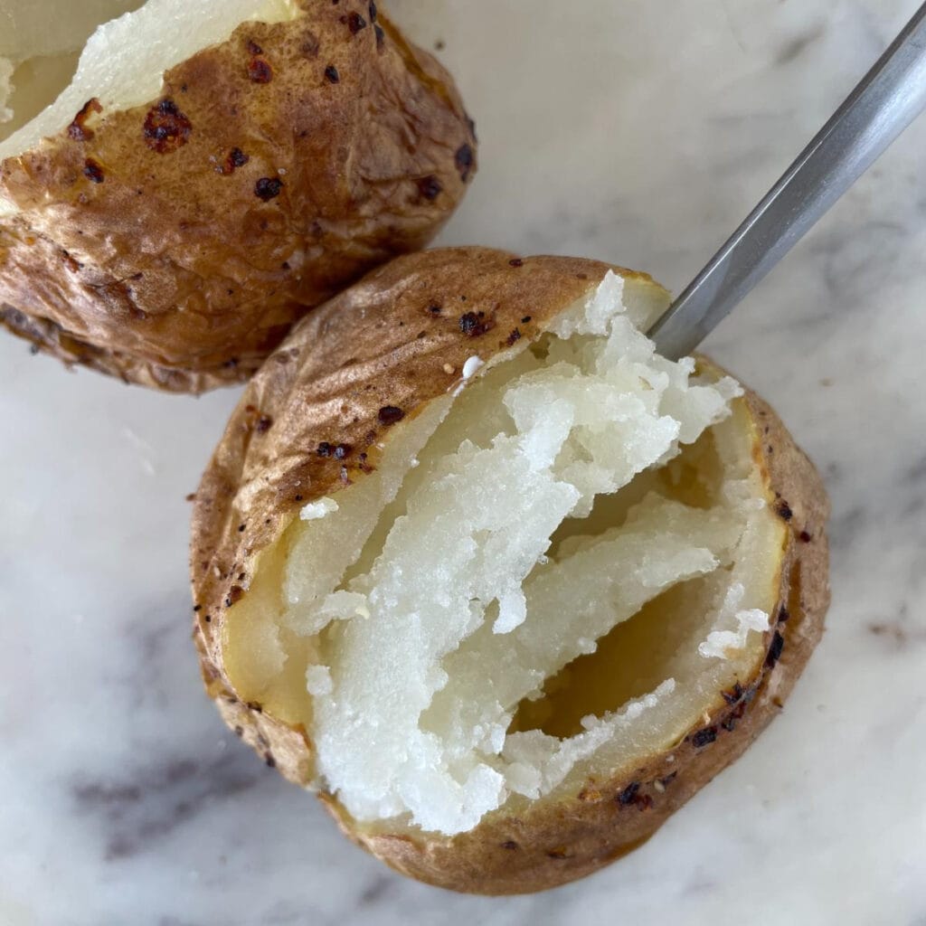 taking out potato filling