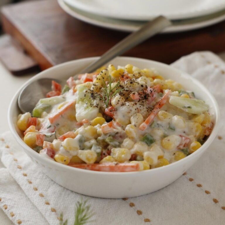 serving of fiesta corn salad with cucumber