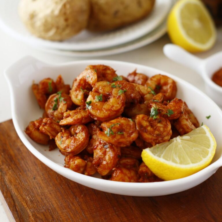 shrimp platter with lemon wedges