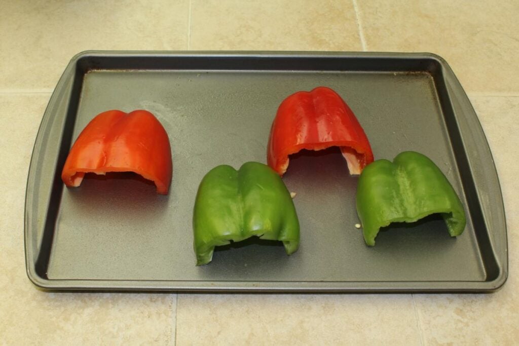 bell pepper halves on a baking sheet