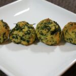 baked spinach lined on a plate
