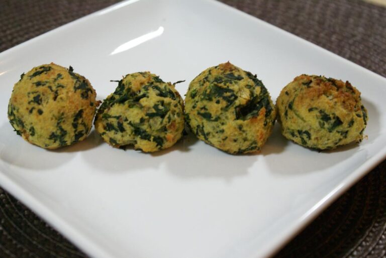 baked spinach lined on a plate