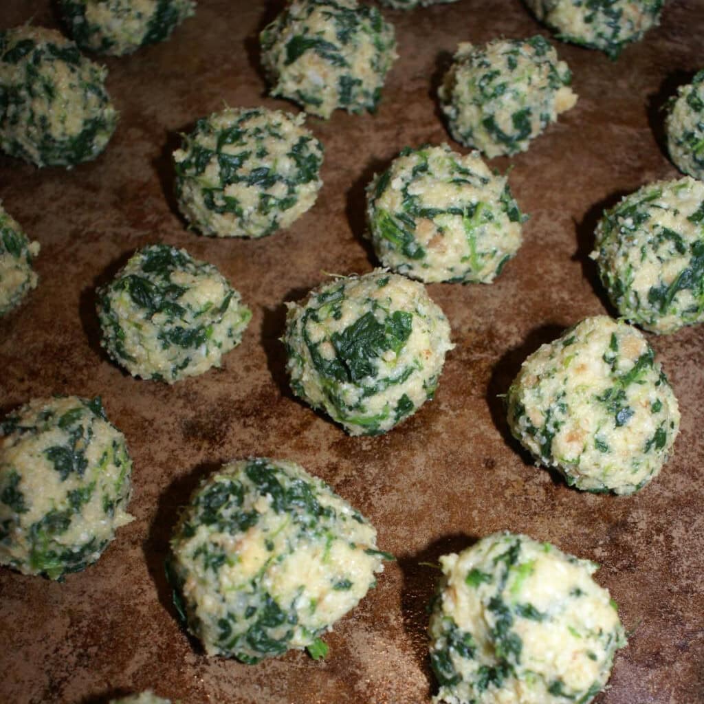 unbaked balls of spinach
