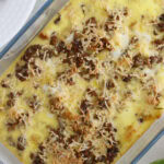 pan of eggs, sausage, milk and more