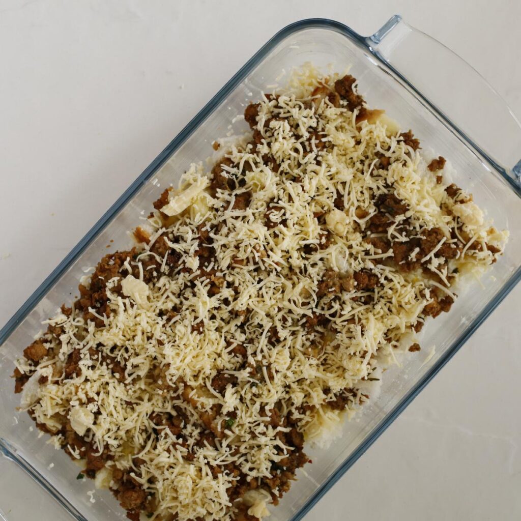 casserole topped with cheese in a baking dish