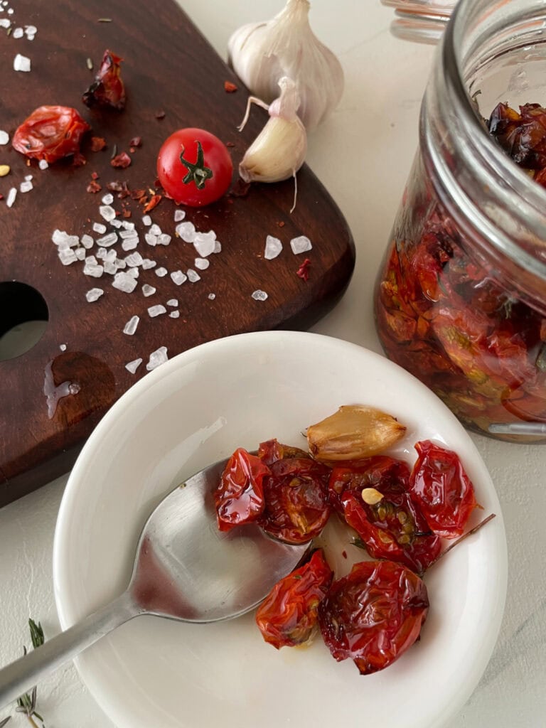 bowl of cherry grapes with garlic, thyme, and olive oil