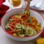 scoop of cucumber and bell pepper