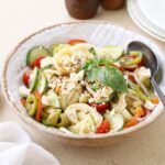 beautiful bowl of pasta and salad mixed together
