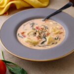 bowl of slow cooked soup with tortellini