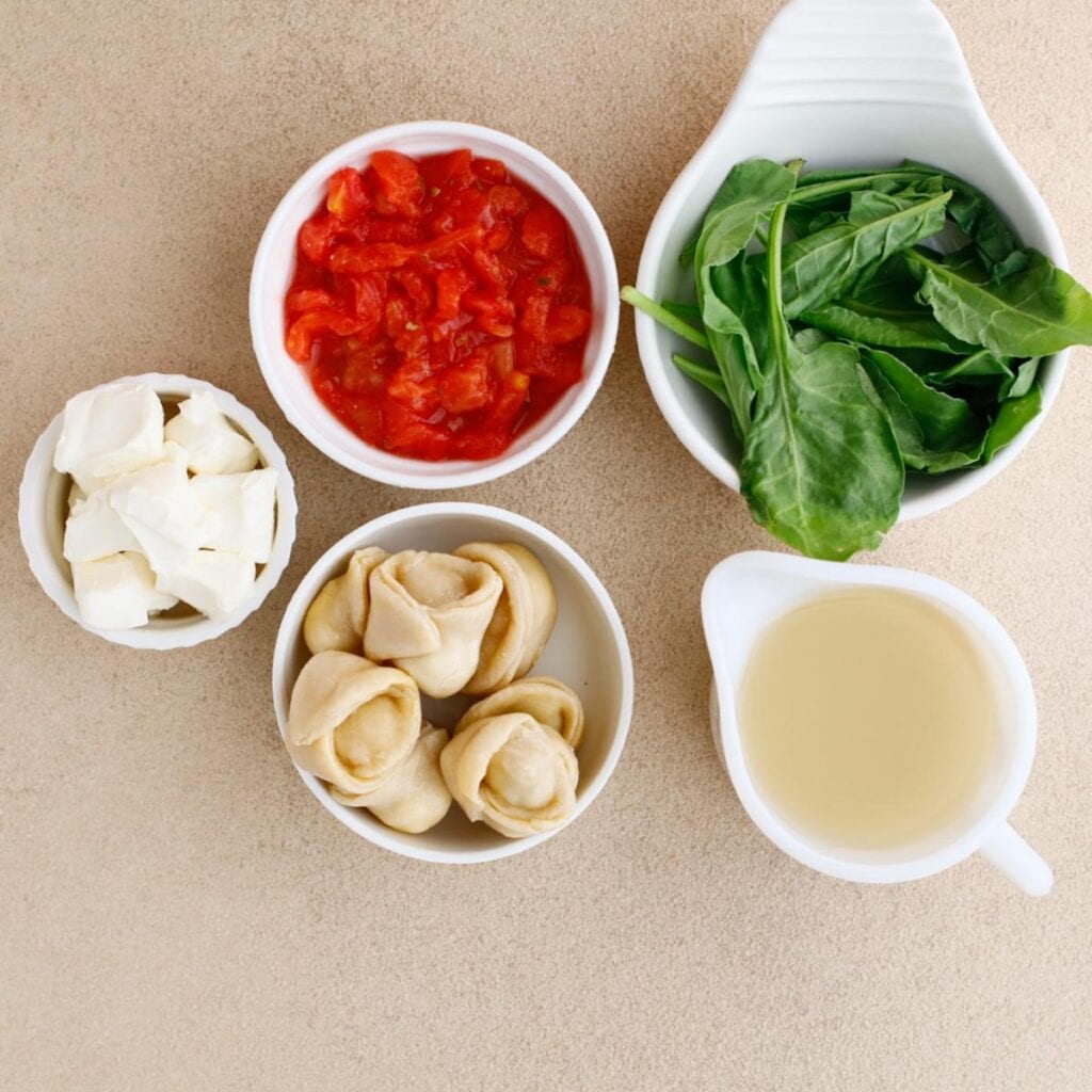spinach, tomatoes, tortellini, cream cheese and broth