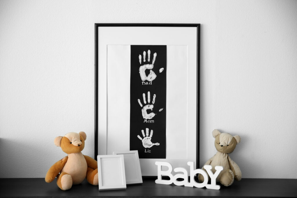 baby handprints in frame