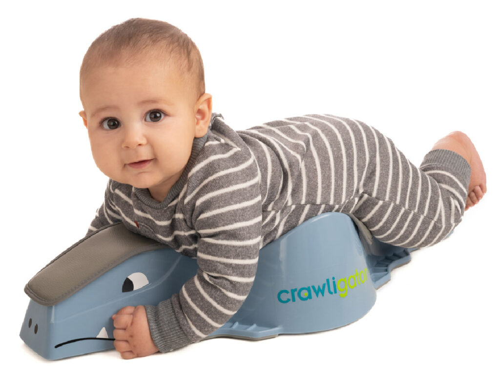 baby laying on crawligator