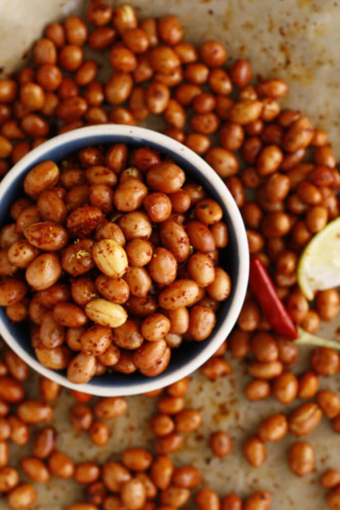 Top view of a bowl of seasoned peanuts
