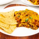 plate of casserole with cheese topping