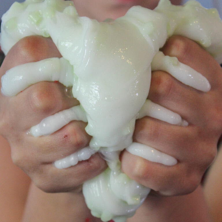 squishing slime with hand