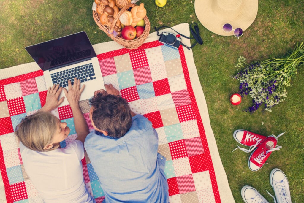 two people laying on a quilt. artistic keepsake ideas