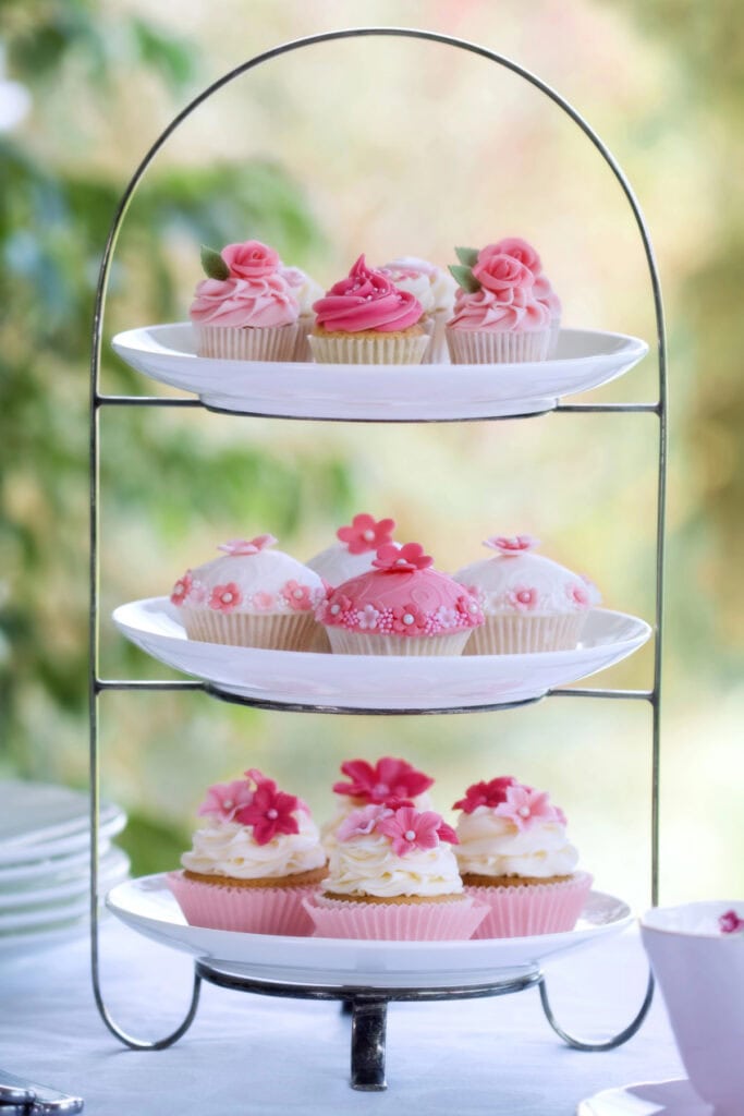 tiered tray with cupcakes at a tea party