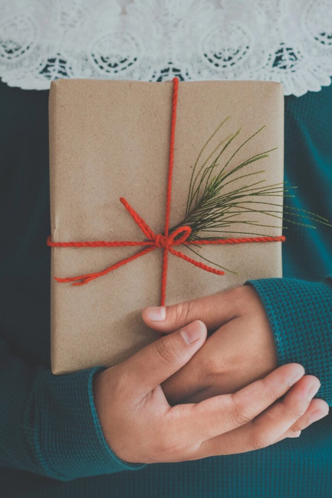 Hands holding a Christmas gift