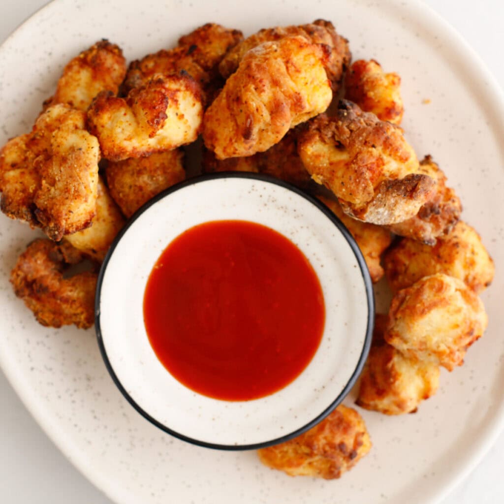 Cooked nuggets with sauce