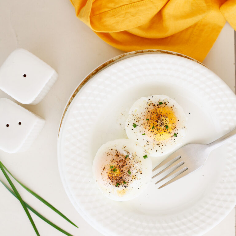 Poached Eggs with onion leaves